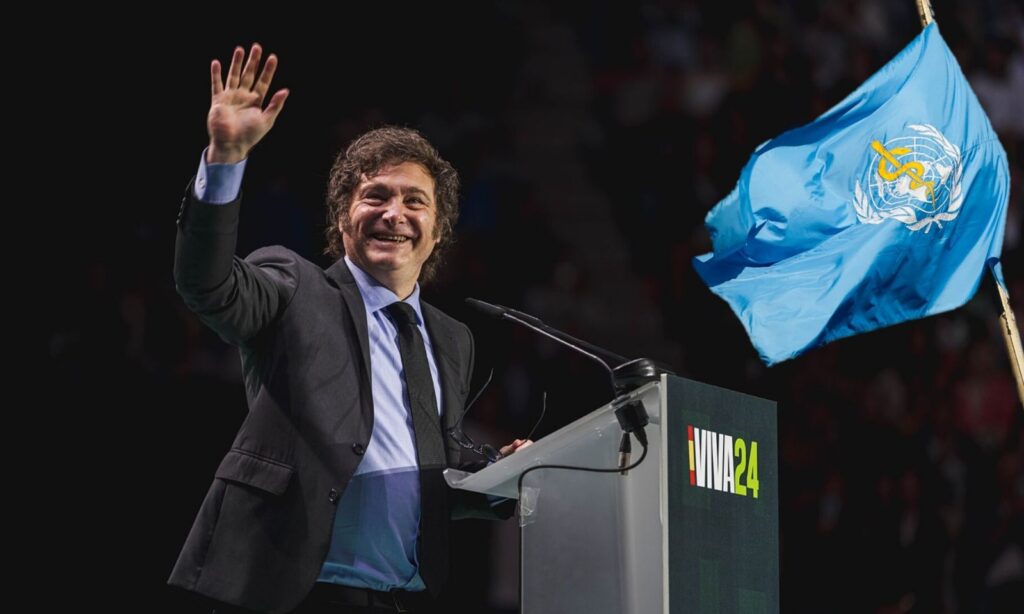 Javier Milei und WHO-Fahne